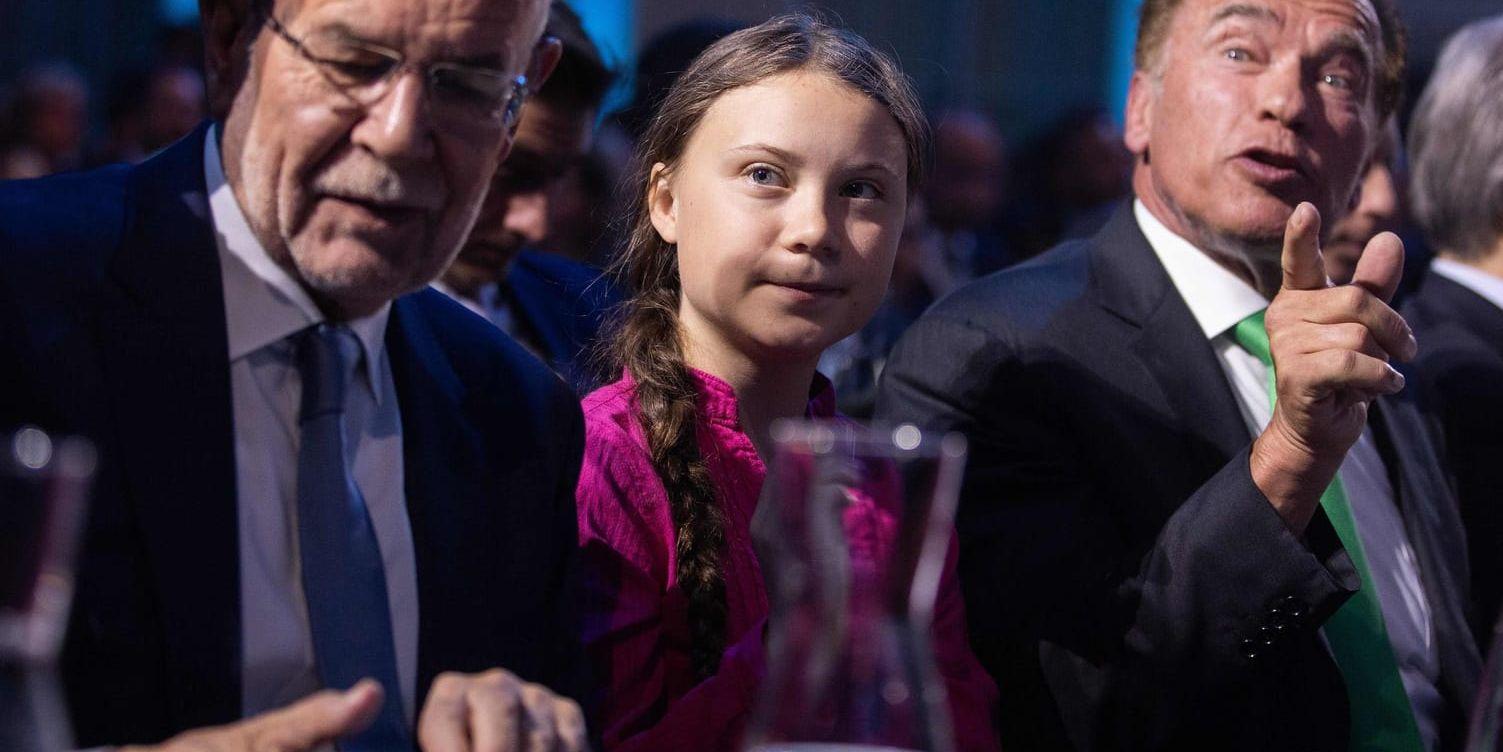 Klimataktivisten Greta Thunberg, Österrikes president Alexander Van der Bellen och tidigare guvernören och filmstjärnan Arnold Schwarzenegger tillsammans under klimatkonferensen R20 i Wien.