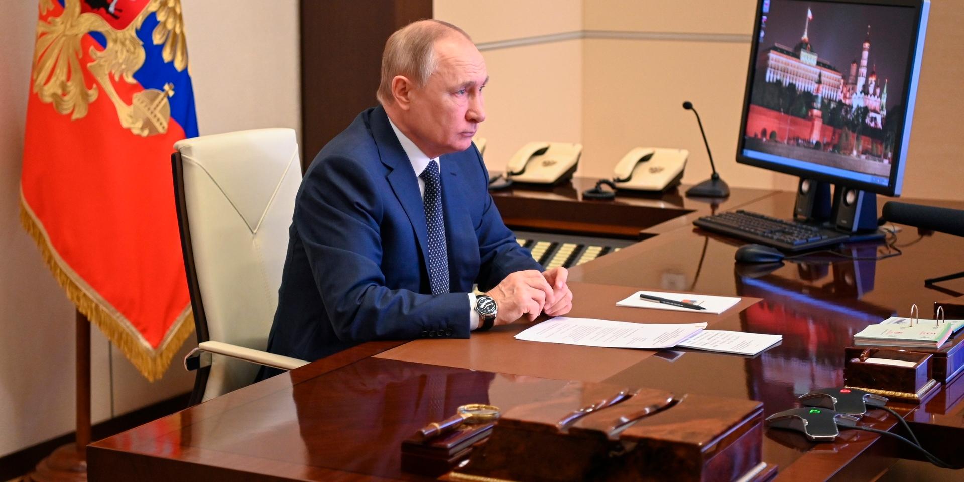 Russian President Vladimir Putin takes part in the launch of a new ferry via a conference call at the Novo-Ogaryovo residence outside Moscow Moscow, Russia, Friday, March 4, 2022. (Andrei Gorshkov, Sputnik, Kremlin Pool Photo via AP)  RUS106