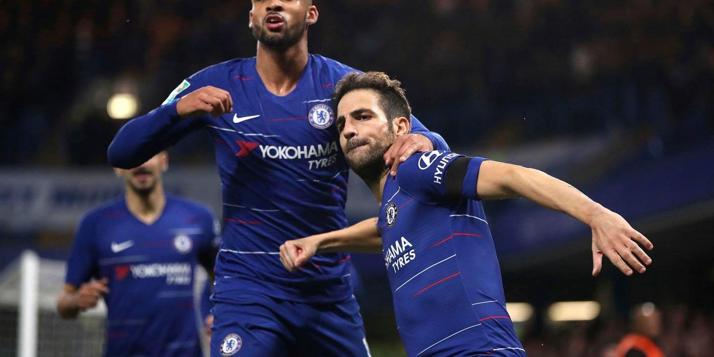 Chelseas Cesc Fabregas (till höger) firar sitt 3–2-mål mot Derby.