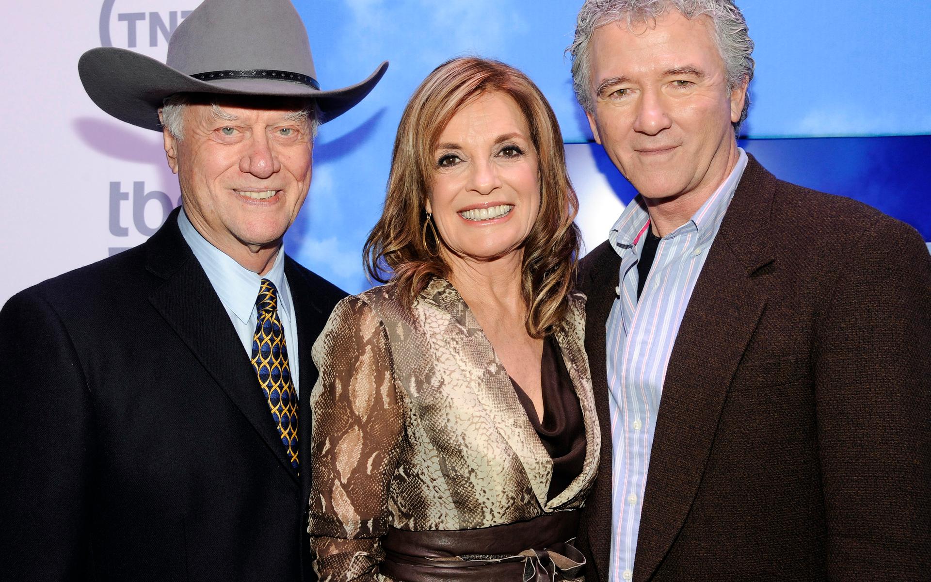 Larry Hagman spelade Linda Grays man ”J.R Ewing” och Patrick Duffy spelade J.R:s bror ”Bobby Ewing” Arkivbild.